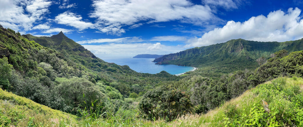 A panorama of the ocean and mountains from a lookout point in Hiva Oa, Marquesas Islands