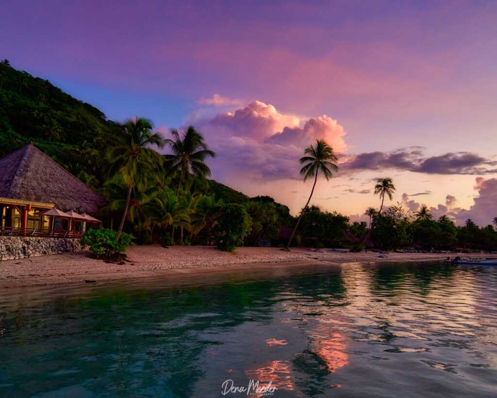 Tahiti Moorea at sunset. A view from the lagoon onto the island.